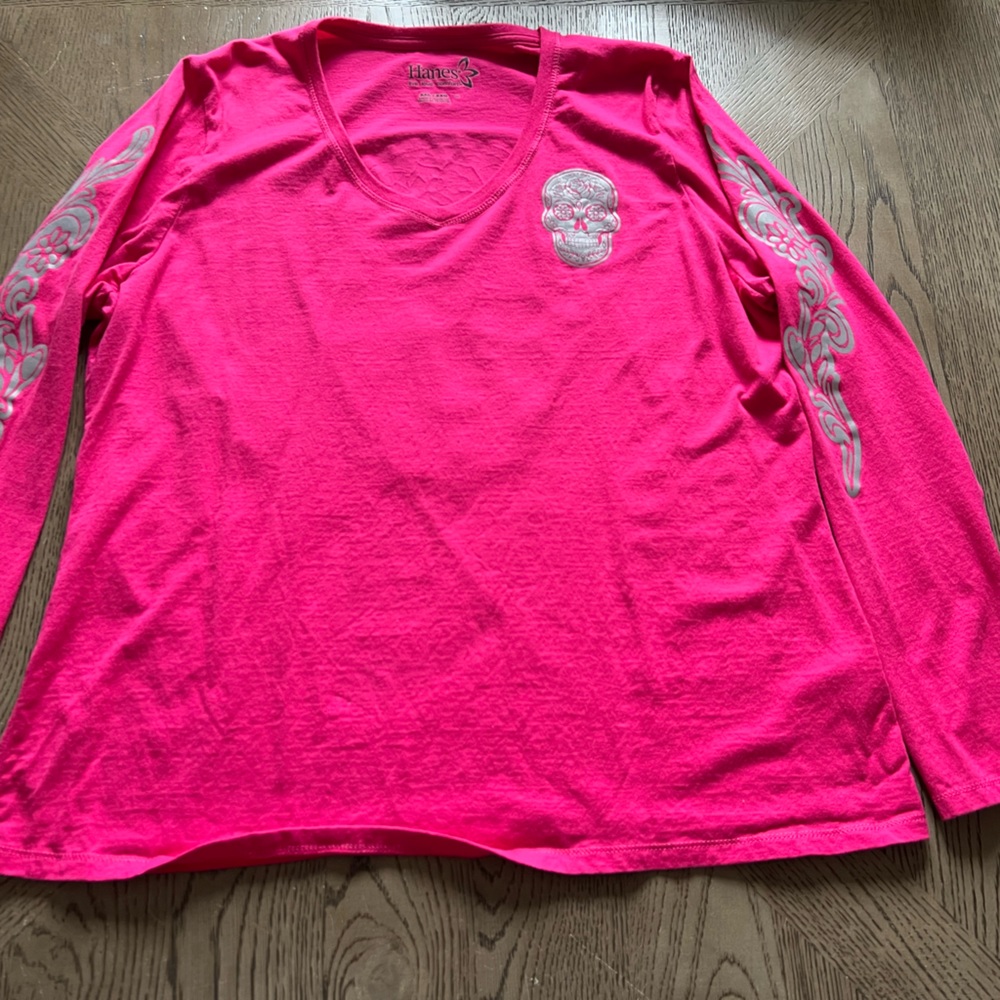 Pink long sleeved T-shirt with reflective design on front, back and sleeves